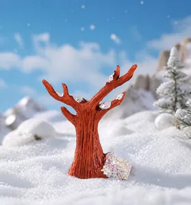 Miniature Christmas snow tree craft with pink glitter and realistic wood texture branch
