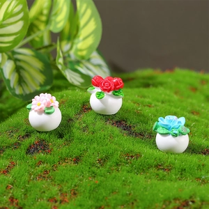 Miniature dollhouse potted flowers with pink roses and blue daisies in white pots