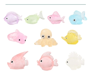 Macro view of colorful resin luminous miniature fish for aquarium landscape decoration