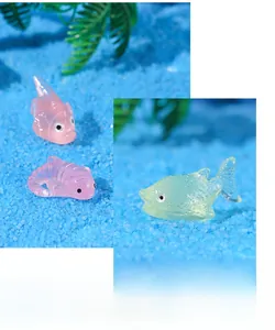 Detailed macro view of colorful translucent resin fish figurines for micro landscapes