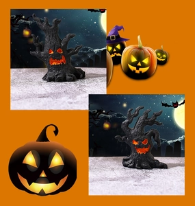 Macro detail of Halloween resin tree craft with glowing orange pumpkin face and wood texture