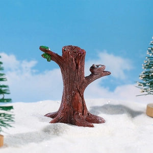Miniature resin tree stump with bird nest for fairy gardens and winter landscapes