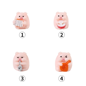 Set of four cute pink resin piglets playing instruments for tabletop micro landscape decor