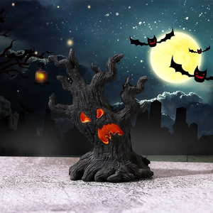 Spooky Halloween resin tree stump with glowing orange face and bat background