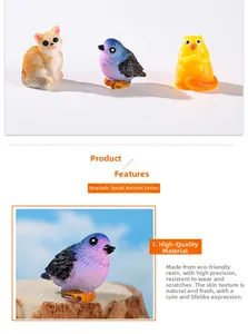 Nahaufnahme süßer Miniatur-Harztiere wie Katze und Vogel für DIY Gartenlandschaften