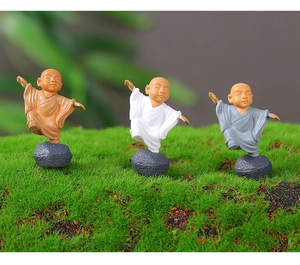 Three Kung Fu monk figurines standing on one leg for bonsai and moss landscape decoration