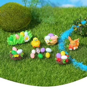Miniature Easter resin scene with bunny, yellow chick, colorful eggs and daisy decor
