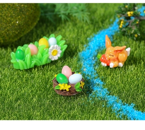 Miniature Easter resin set featuring a bunny, bird nest with eggs, and floral grass patch