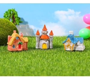 Détails de maisons miniatures en résine avec textures de pierre et toits colorés