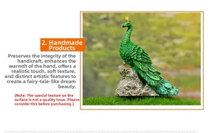 Detailed view of a green resin peacock ornament with golden crown on stone base