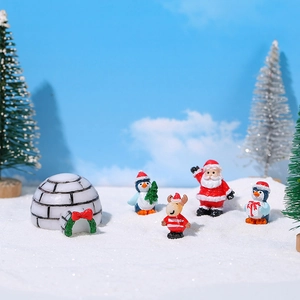 Miniatur Weihnachtsfiguren Set mit Weihnachtsmann, Pinguin, Rentier und Iglu aus Harz