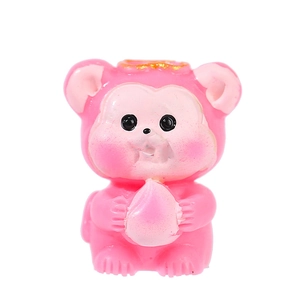 Pink resin monkey figurine with golden crown holding a peach for moss landscape decor