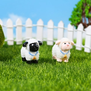 Miniature resin sheep figurines with blue collars and gold bells for micro landscape decor