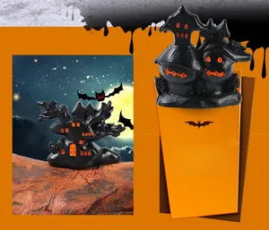 Detailed Halloween house figurines with spooky orange accents and haunted castle designs