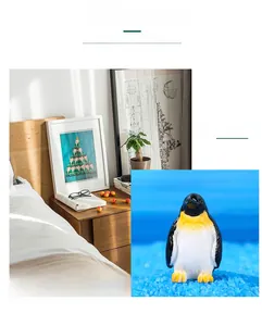 Miniature resin penguin ornament for micro landscape desk decoration with blue sand detail