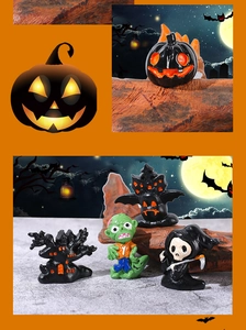 Detailed collection of Halloween resin figurines with pumpkins, ghosts, and haunted houses