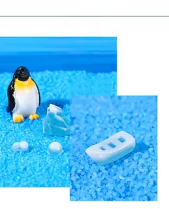 Polar micro landscape decor set featuring resin penguins, icebergs, and a white boat