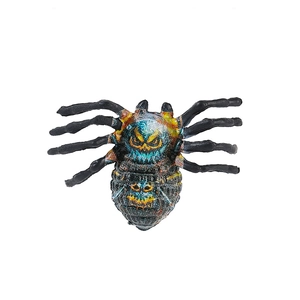 Realistic black Halloween spider figurine with colorful spooky pumpkin face patterns