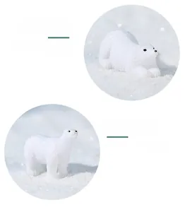 Detailed view of miniature polar bear figurines with textured fur in standing and lying poses
