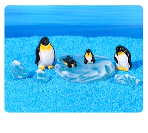 Miniature resin penguins and iceberg landscape set for decorative micro scenes