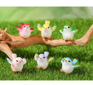 Detailed view of six colorful resin birds for micro landscape gardening and succulent decor