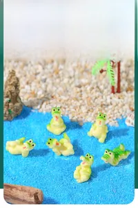 Set of six mini resin crocodile figurines in a beach micro landscape scene