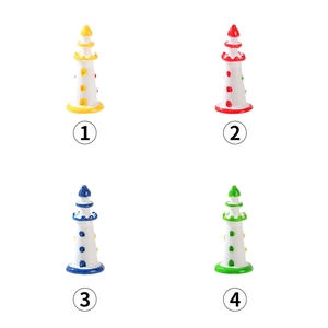 Set di quattro fari in miniatura in stile mediterraneo nei colori giallo, rosso, blu e verde