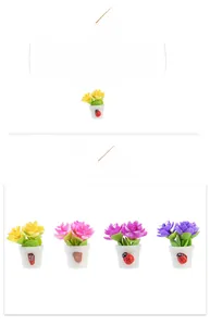 Miniature dollhouse potted plants with colorful flowers and ladybug detail