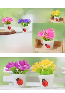 Miniature dollhouse potted plants with colorful flowers and small ladybug details