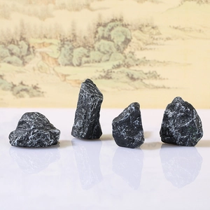 Set of 4 black miniature landscape stones for Zen garden and bonsai decor with rock texture