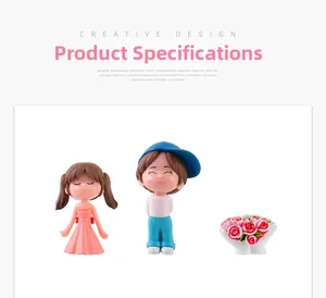 Detailed view of mini resin figurines featuring a girl in pink dress and boy in blue cap