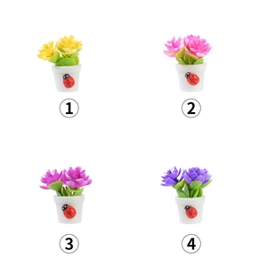 Miniature dollhouse potted plants with ladybug decor in yellow pink and purple colors