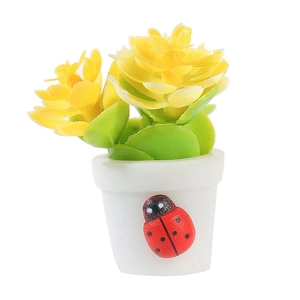 Miniature dollhouse potted plant with yellow flowers, green leaves and a tiny ladybug