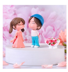 Miniature couple dolls for micro landscape featuring a cute boy and girl with red roses