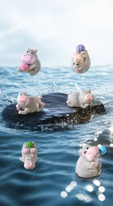 Detailed set of six miniature resin hippo figurines in various playful poses for DIY decor
