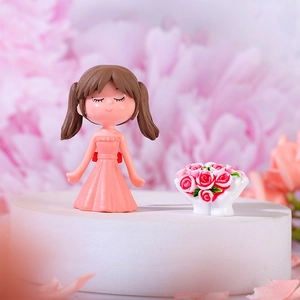 Cute couple doll figurines set with girl in pink dress and miniature rose bouquet