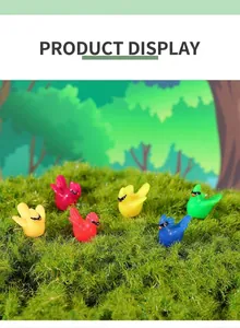 Detailed view of six colorful resin hummingbird miniatures on green moss decor