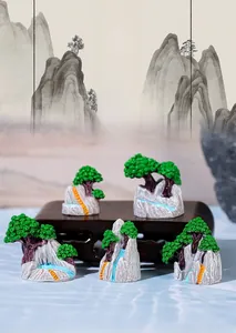 Macro shot of miniature resin mountain landscapes for Zen desktop decoration