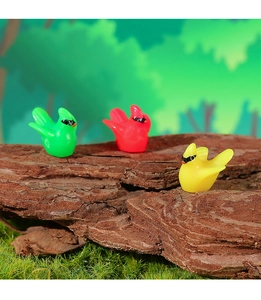 Three colorful resin hummingbird miniatures on bark for micro landscape decor