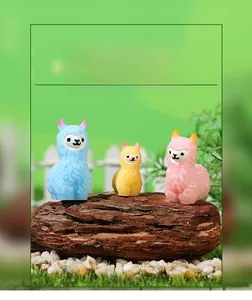 Three colorful resin alpaca figurines on wood for moss micro landscape DIY decoration