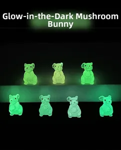 Luminous resin rabbit figurines glowing in green for moss landscape and garden decor