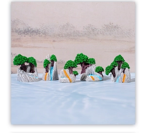 Detail of five-piece miniature zen rockery and pine tree resin landscape decorations