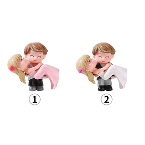 Romantic bride and groom miniature figurines in pink and white wedding dresses for DIY decor