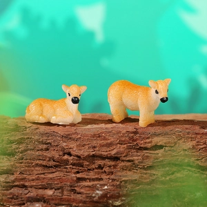 Miniature resin cow figurine set on natural wood bark for creative garden landscape decor