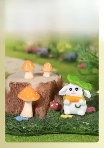 Miniature garden resin set featuring a cute bunny with leaf hat and orange polka dot mushrooms