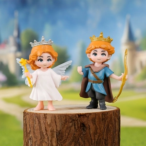 Cartoon angel princess and prince resin ornaments on wood stump with castle background