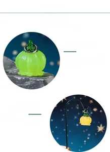 Detail of glow-in-the-dark resin bellflower charms with metal rings for garden decor