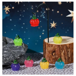 Luminous bell orchid resin pendants arranged in a magical fairy garden scene with blue lights