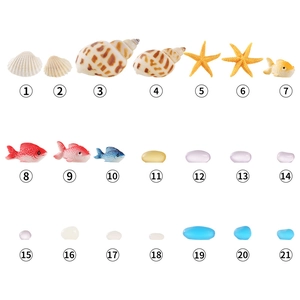 Assorted ocean resin ornaments with colorful fish, starfish, shells for aquarium decor