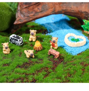 Detalle de set de paisaje miniatura Capybara con figuras de resina en escena jardín